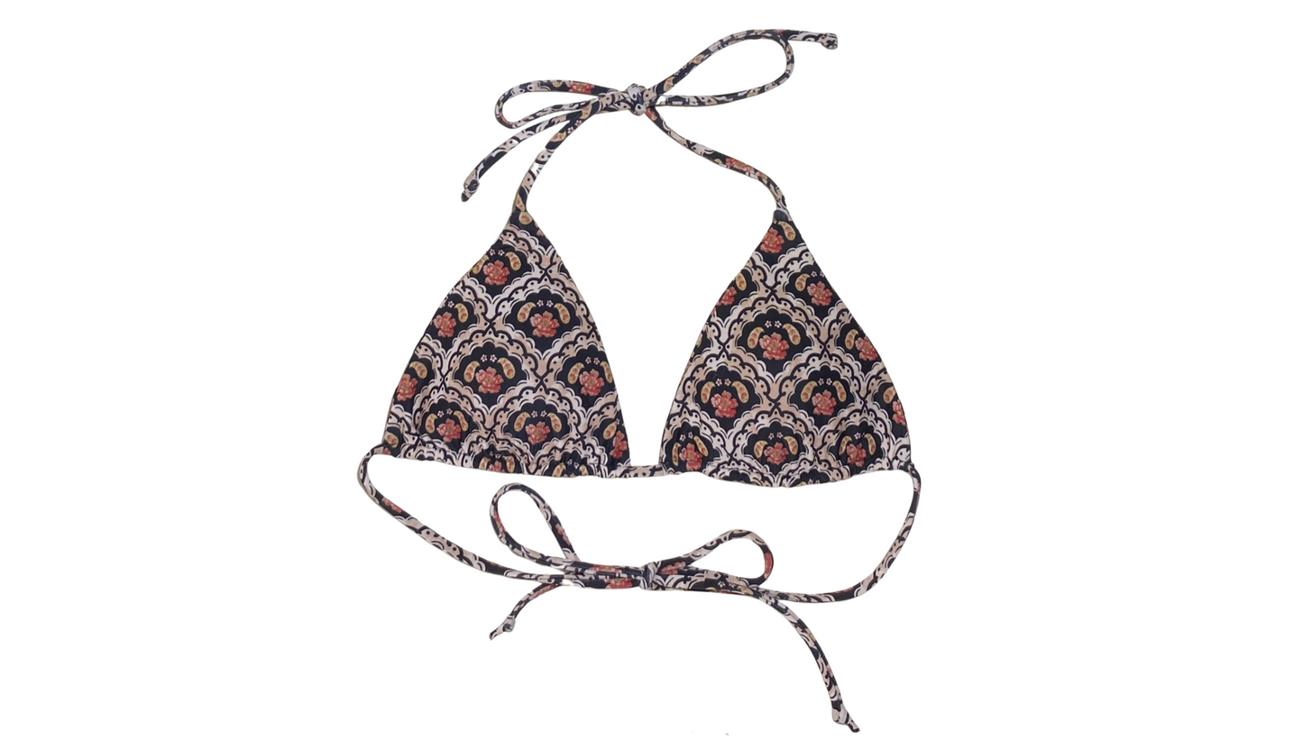 AYA TRIAGANO SIERA thong g string bikini in triangle top and string tie side bottoms with floral art deco print at the beach